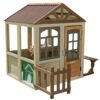 KidKraft Pioneer Cottage Wooden Playhouse – Outdoor Toy for Kids, Playhouse with Porch