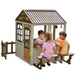 KidKraft Pioneer Cottage Wooden Playhouse – Outdoor Toy for Kids, Playhouse with Porch
