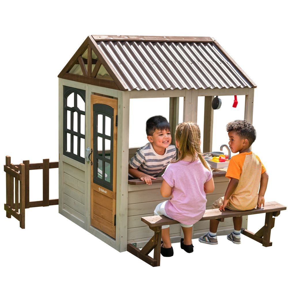 KidKraft Pioneer Cottage Wooden Playhouse – Outdoor Toy for Kids, Playhouse with Porch