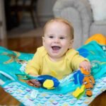 Bright Starts Disney Baby Finding Nemo Pop ‘N Jump Foldable Activity Center – Portable Baby Jumper with Toys for 6 to 12 Months
