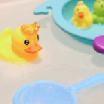 Moon – Bath Duck Toy With Assorted Mini Ducks, Boat And Sieve – Multicolor