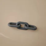Mushie – Links Teether – Tradewinds
