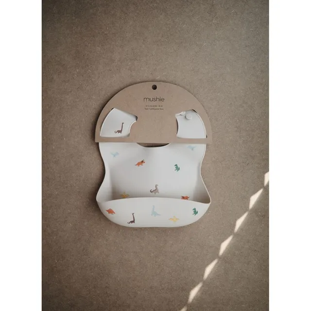 Mushie - Silicone Baby Bib Printed Colors - Dinosaurs