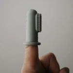 Mushie – Finger Toothbrush Clay/Shifting Sand
