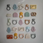 Mushie – Teether Sun Muted Yellow